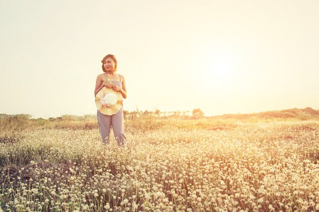 Pensive girl in the meadow