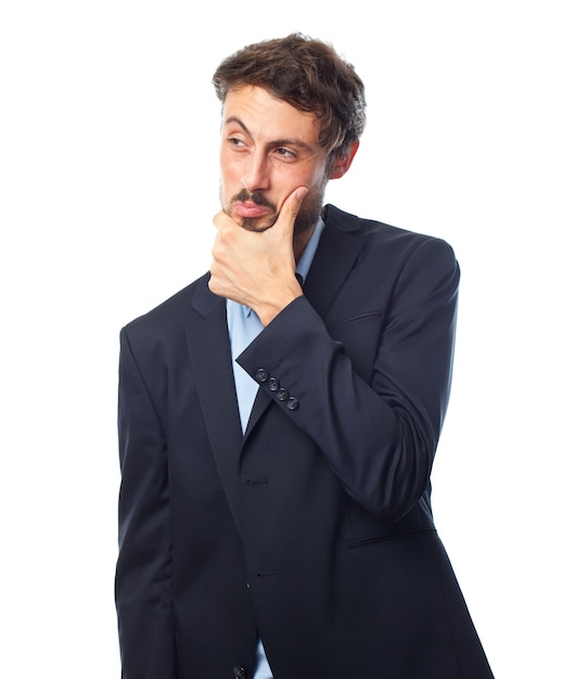Free photo pensive man with hand on chin