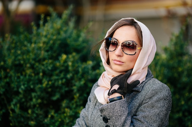 Free photo pensive woman with a scarf around her head