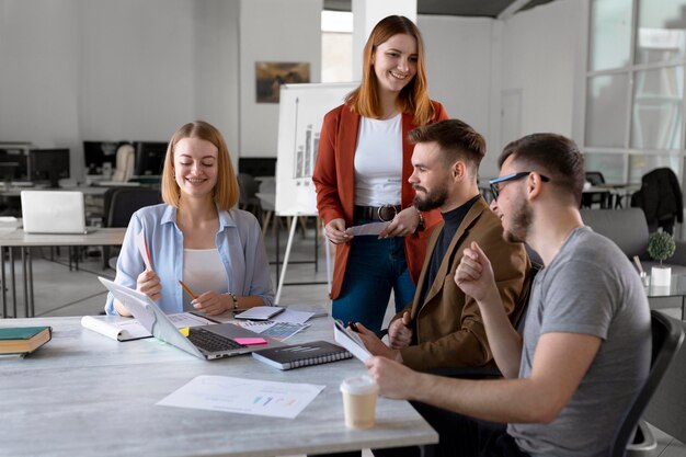 People brainstorming in a work meeting