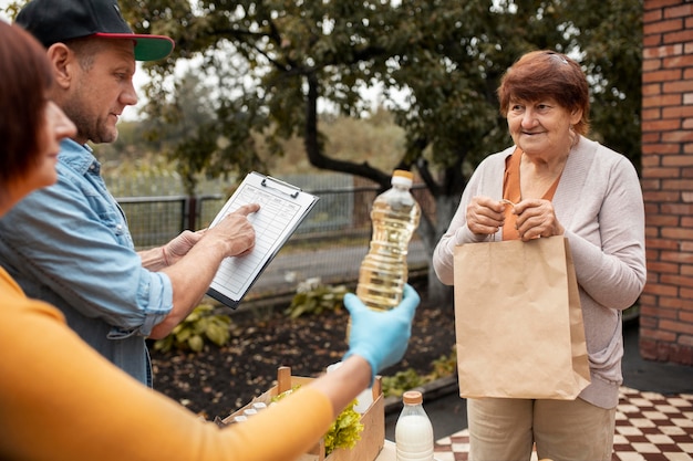 People bringing supplies to neighbors