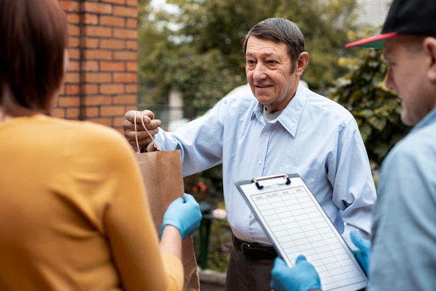 People bringing supplies to neighbors