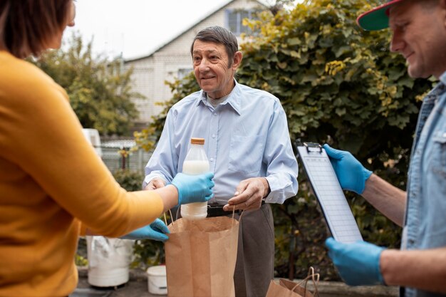 People bringing supplies to neighbors