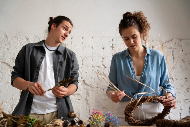 People building their own dried arrangement