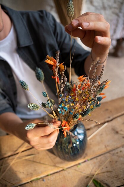 People building their own dried arrangement