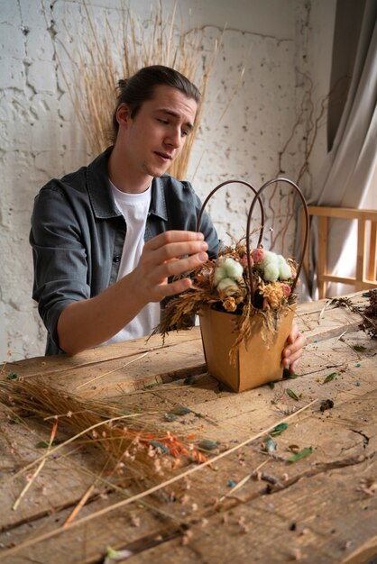 People building their own dried arrangement