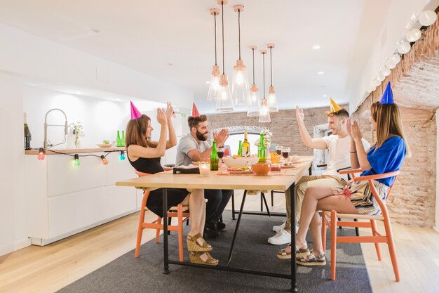 People celebrating at desk