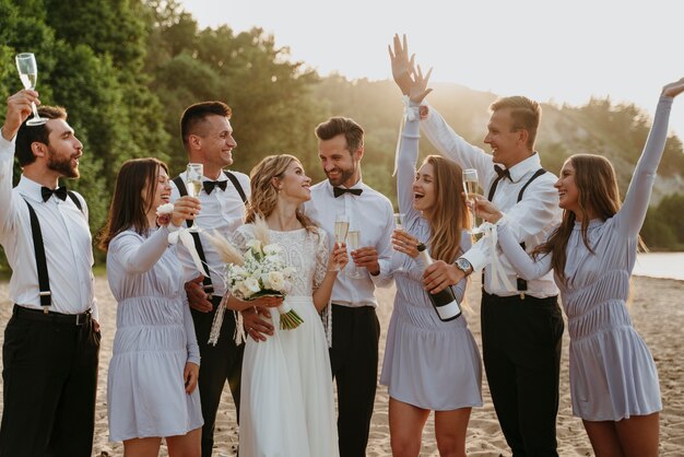 People celebrating a wedding on the beach