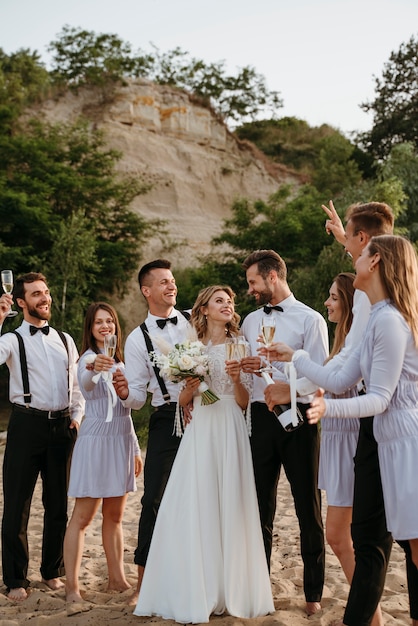 People celebrating a wedding on the beach