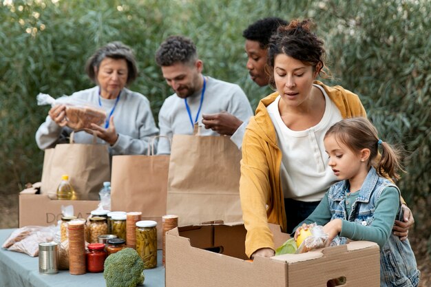 people collecting food donations medium shot