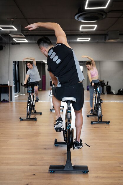people doing indoor cycling