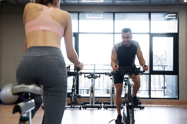 People doing indoor cycling