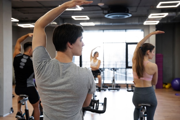 People doing indoor cycling