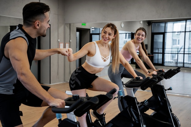 people doing indoor cycling