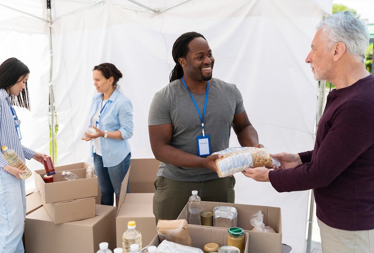 Free Photo people doing volunteer work at a foodbank