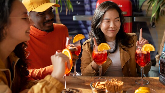 People drinking cocktails