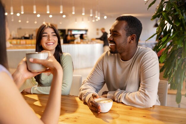 People drinking coffee in spacious cafeteria