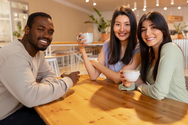 People drinking coffee in spacious cafeteria