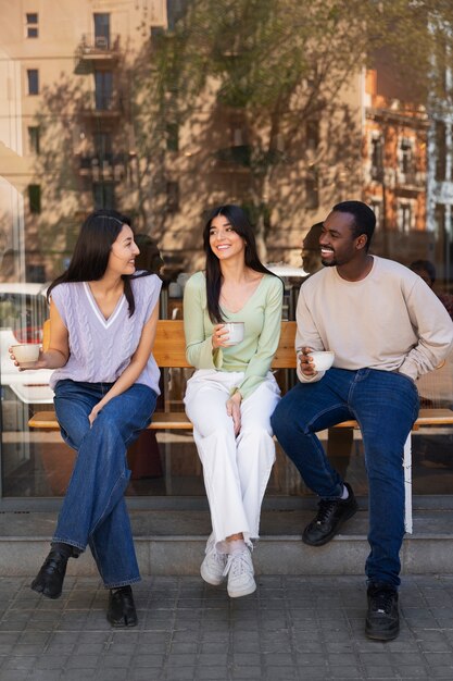 People drinking coffee in spacious cafeteria