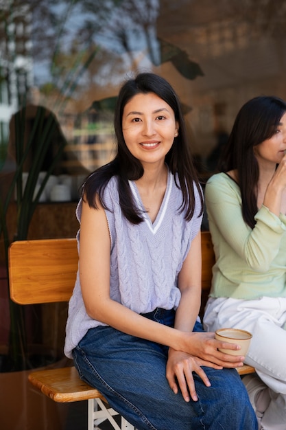 People drinking coffee in spacious cafeteria