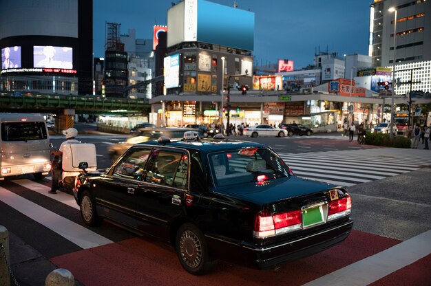 People driving cars on the city street