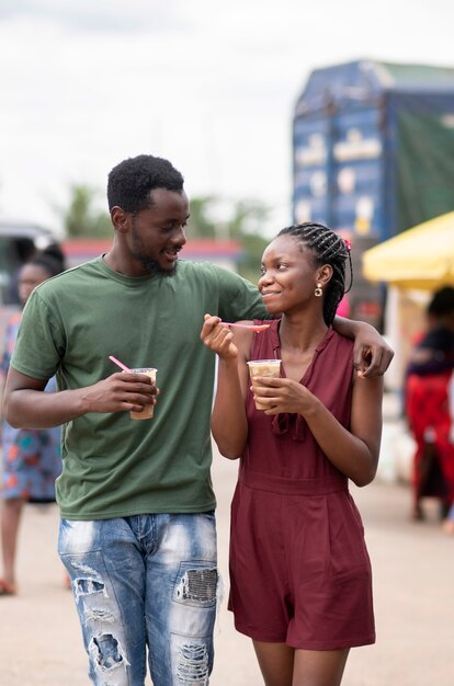 People eating a cold beverage