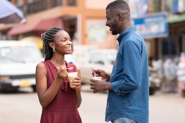 People eating a cold beverage