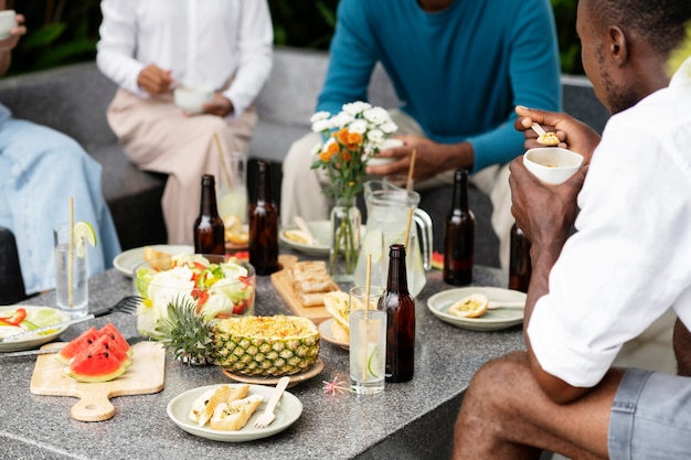 People eating in exterior party high angle