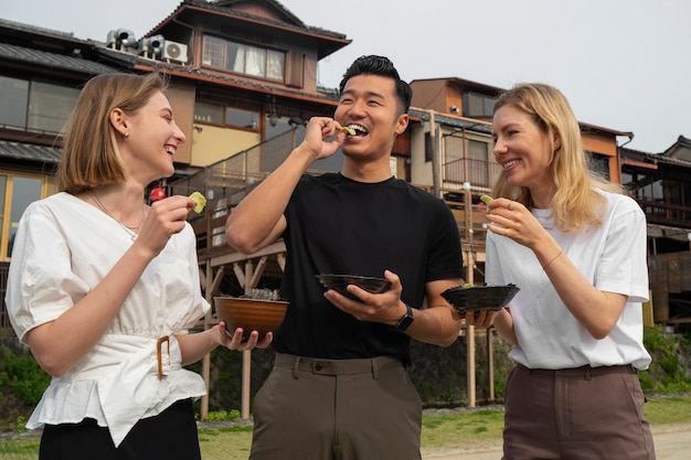 People eating seaweed snacks