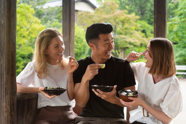 People eating seaweed snacks