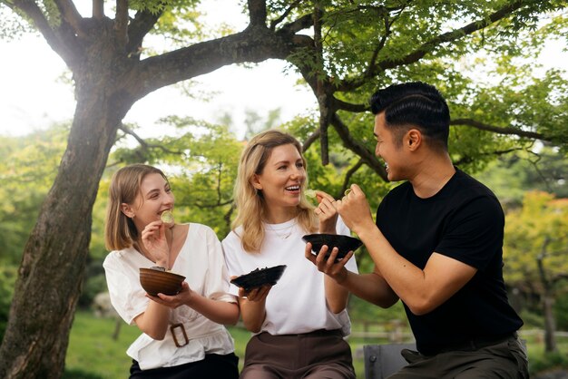 People eating seaweed snacks