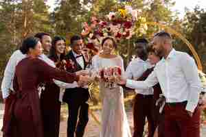 Free photo people enjoying burnt orange wedding