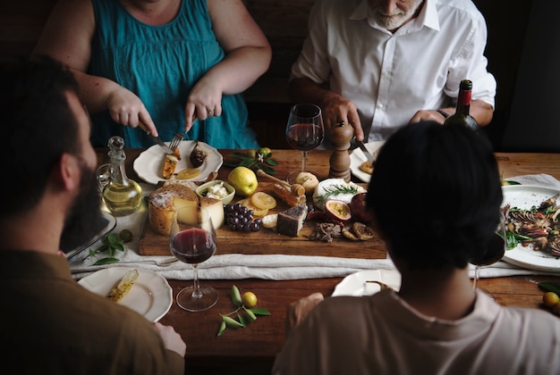 People enjoying a cheese platter food photography recipe idea