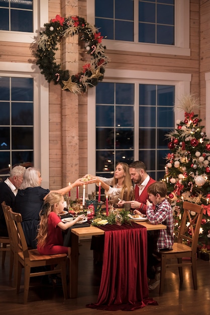 Free photo people enjoying a festive christmas gathering