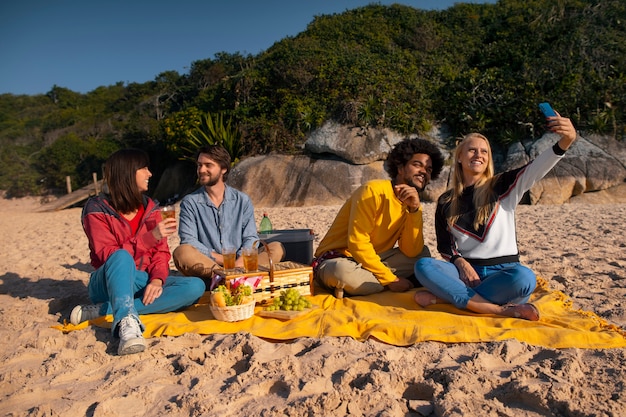 Free photo people enjoying guarana drink outdoors