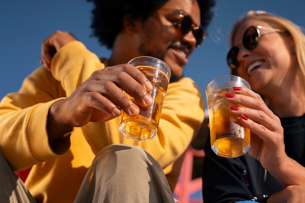 People enjoying guarana drink outdoors