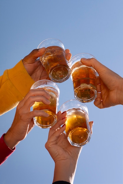 Free photo people enjoying guarana drink outdoors