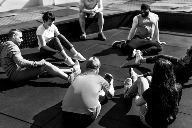 People exercising at fitness gym