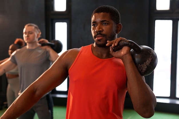 Free photo people exercising in the gym