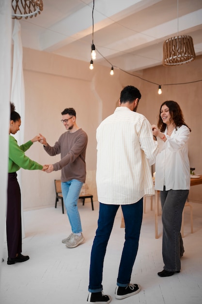 People having a casual salsa dance themed get-together