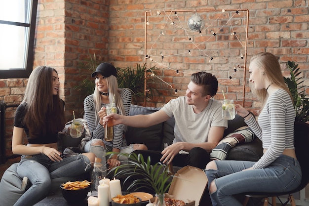 People having drinks and celebrating at the bar