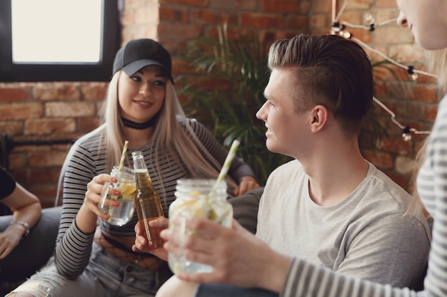 People having drinks and celebrating at the bar