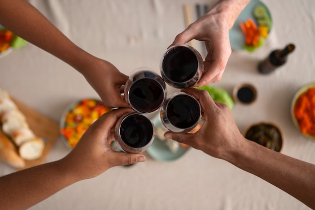 Free photo people having food and drinks at a dinner party