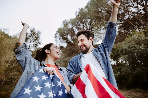 People having fun with flag