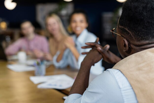 People having an office meeting