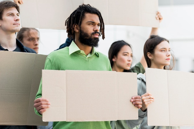 people holding empty cardboards black lives matter concept