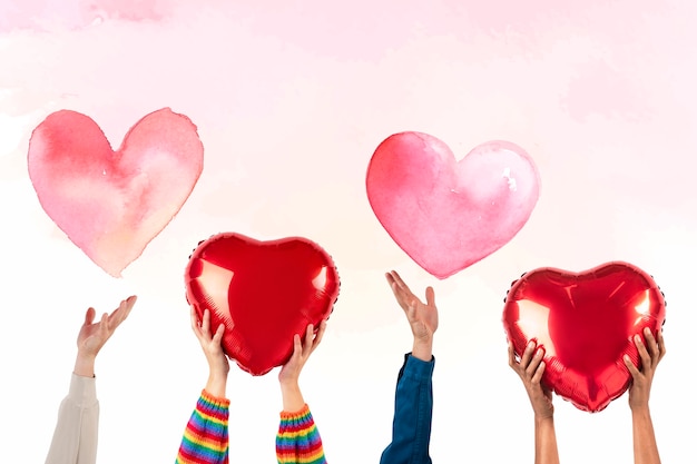 People holding hearts for Valentines&amp;rsquo; celebration