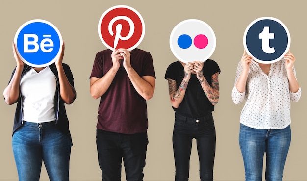 People holding icons of digital brands