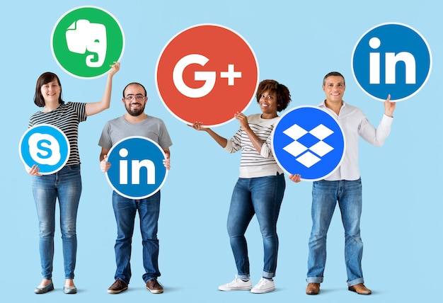 Free photo people holding icons of digital brands