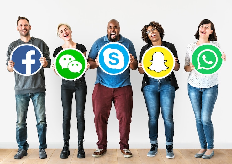Free Photo people holding icons of digital brands